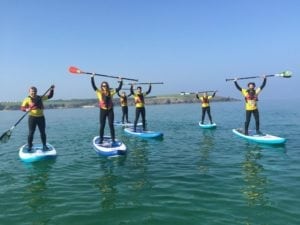 group stand up paddle boarding