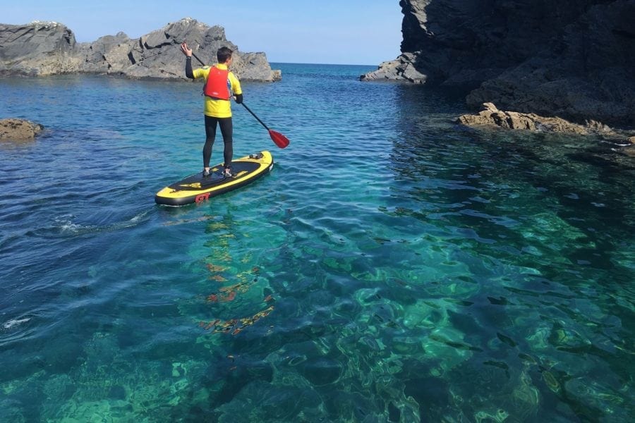 SUP and clear blue water on the coast