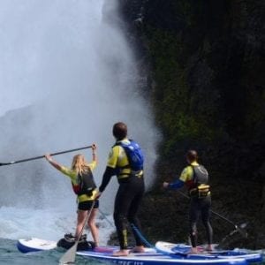 SUP group under water fall